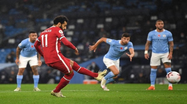 تعادل مثير بين ليفربول ومانشستر سيتي لصالح أرسنال في الدوري الإنجليزي